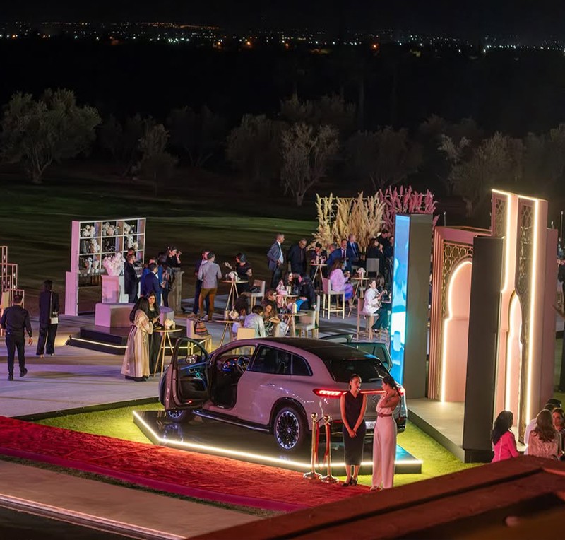 Seating pods beneath suspended screens at Morocco Gaming Expo