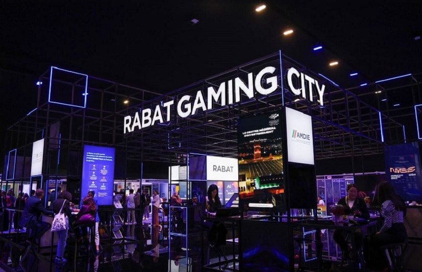 The Rabat Gaming City pavilion at Morocco Gaming Expo 2024, with a light-outlined grid structure and screens